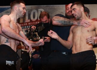 Caterall grabs Taylor’s throat in a foul face JOSH TAYLOR v JACK CATTERALL  25-2-2022.SSE HYDRO,.GLASGOW.PIC LAWRENCE LUSTIG.IBF/WBC/WBA/WBO SUPER-LIGHTWEIGHT CHAMPIONSHIP OF THE WORLD.JOSH TAYLOR V JACK CATTERALL WEIGH IN