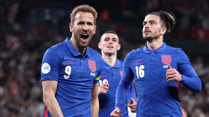Harry Kane celebrates after giving England the lead from the penalty spot