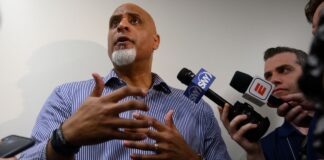 MLBPA exec: No conflict in split player voting

