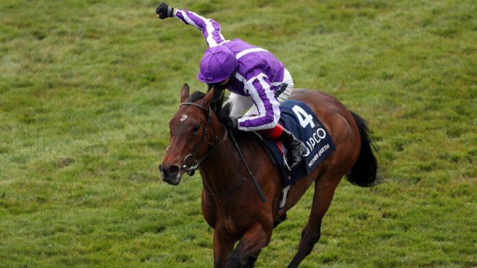 Mother Earth ridden by jockey Frankie Dettori wins the Qipco 1000 Guineas