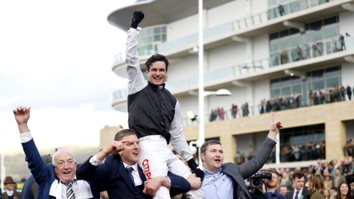Danny Mullins is lifted around the Cheltenham parade ring by Flooring Porter&#39;s owners after winning the Stayers&#39; Hurdle