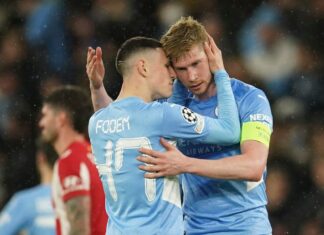 Phil Foden and Kevin De Bruyne celebrate during Manchester City's victory over Atletico Madrid at the Etihad Stadium
