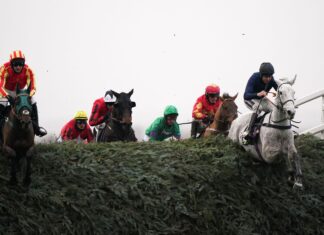 Snow Leopardess navigates The Chair at Aintree