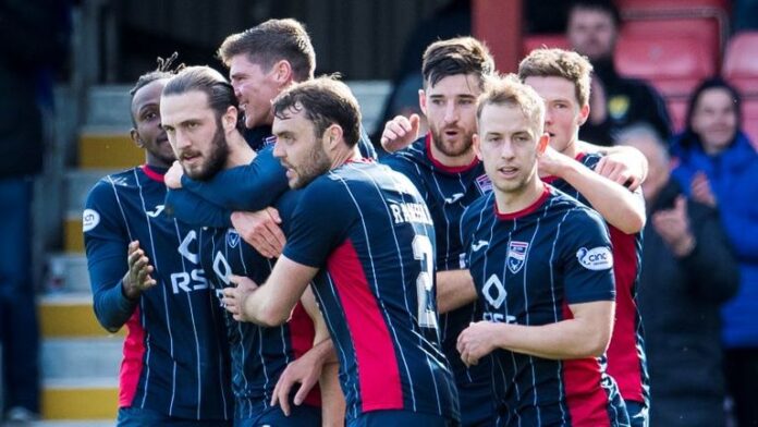 Alex Iakoviti (16) celebrates his goal with his Ross County teammates to make it 1-0 during the Premier League match between Ross County and Hearts at Global Energy Stadium
