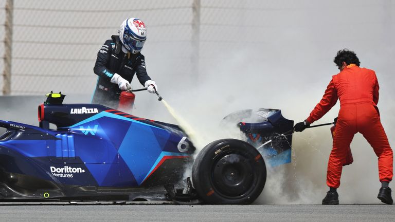 Nicholas Latifi's rear brake caught fire in his Williams during day two of testing in Bahrain, so grab an extinguisher and help put out the flames