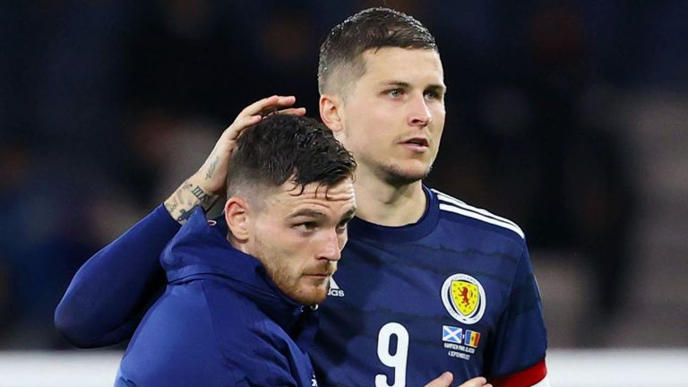 GLASCOW, SCOTLAND - SEPTEMBER 4: Scotland's full-time Andy Robertson (left) and Lyndon Dykes during a World Cup qualifier match between Scotland and Moldova at Hampden Park, on September 4, 2023, in Glasgow, Scotland.  Alan Harvey/SNS Group)