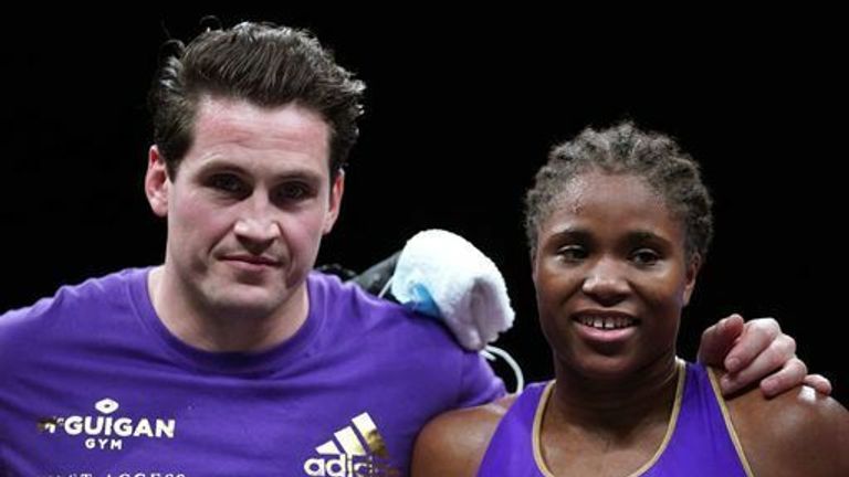 Caroline Dubois (right) and coach Shane McGuigan celebrate their points victory over Vaida Masiokaite (not pictured) in the lightweight competition at the Motorpoint Arena Cardiff. 
