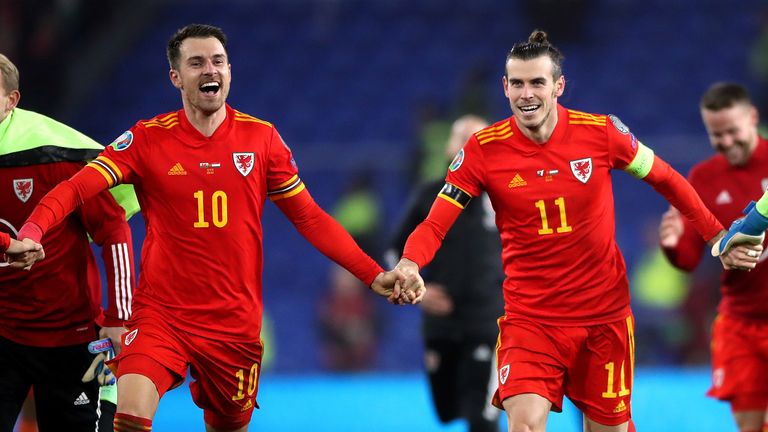 Wales & # 39;  Aaron Ramsey (left) and Gareth Bale (right) celebrate victory and qualification after the final whistle in the UEFA Euro 2020 qualifiers at Cardiff City.  Palestinian Authority photo.  Photo date: Tuesday, November 19, 2019. Check out the SOCCER Wales story.  Must read photo credit: Nick Potts / PA Wire
