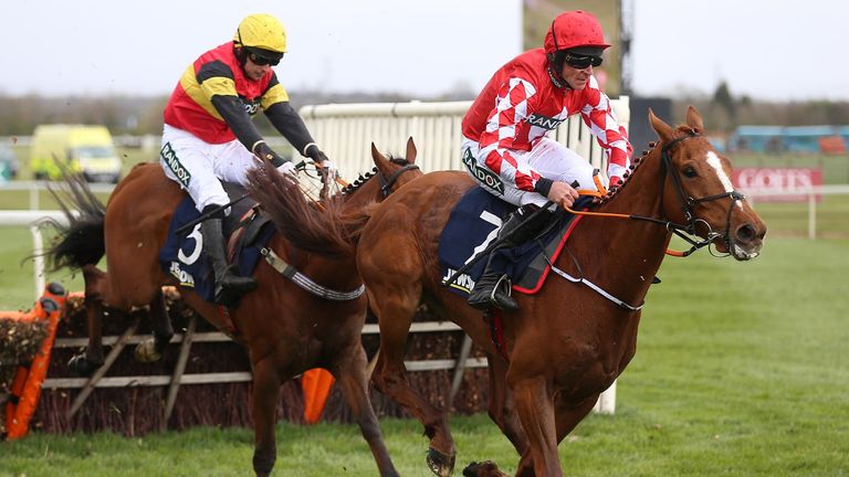 Knight Salute riding Paddy Brennan (left) and Pied Piper traversed by Davy Russell last jump resulting in dead heat between the two (interim score pending host inquiry) at Jewson Anniversary 4-YO Juvenile Hurdle at Aintree Racecourse, Liverpool.  Photo date: Thursday, April 7, 2023.