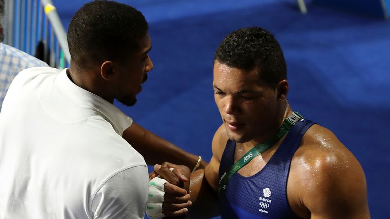 Anthony Joshua comforts Joe Joyce after losing the 2016 Olympics (PA) final