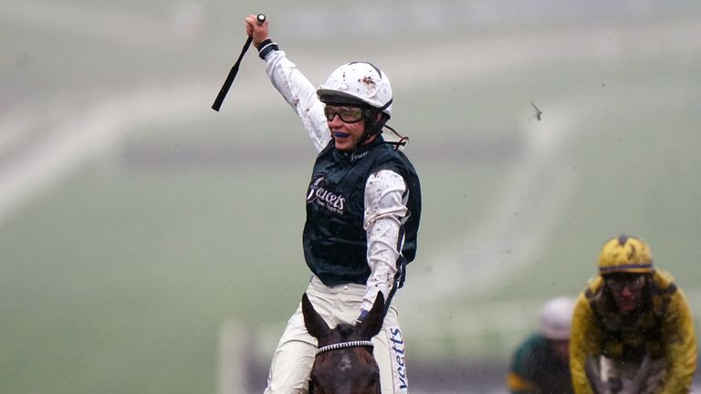 Charlie Deutch salutes the crowd after landing first Cheltenham Fest winner on L'39;s  Home Presse