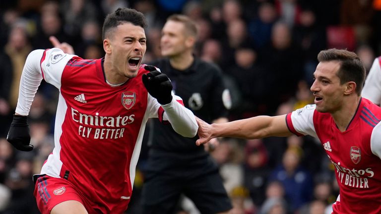 Gabriel Martinelli celebrates Arsenal with his teammates after scoring his team's third goal (AP)