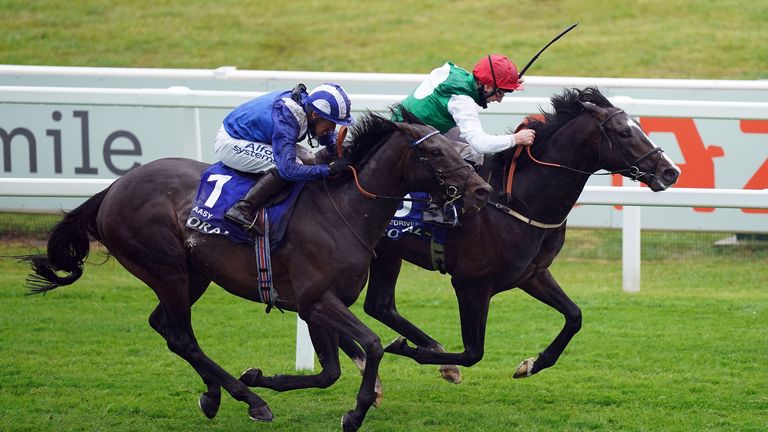 Beldriver (the far side) beats Al-Asi in the coronation cup in Epsom