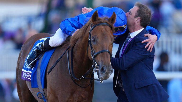 Charlie Appleby and William Buick embrace after winning Breeders'  cup mile