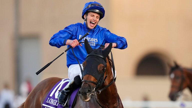 William Buick celebrates after riding a Yipper to victory in Breeders' Game  grass cup
