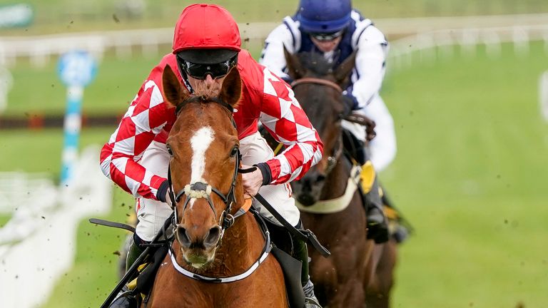 Davy Russell rides with Piper's hand 
