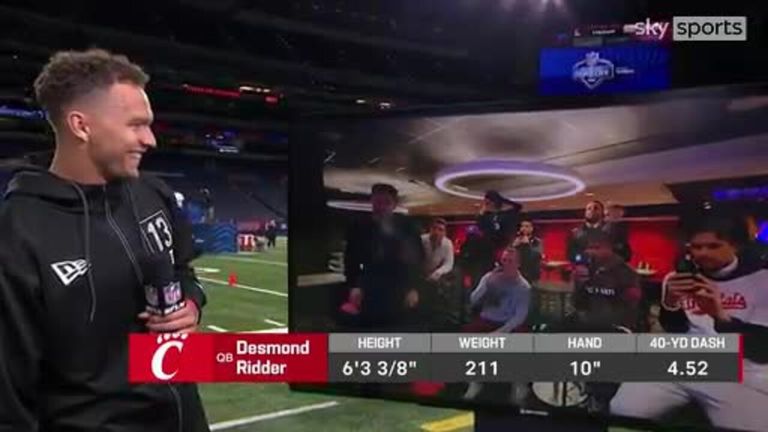Cincinnati Bearcats quarterback Desmond Ryder reacts to his Cincinnati teammates cheering him on during his 40-yard dash at the 2022 NFL Scouting Combine