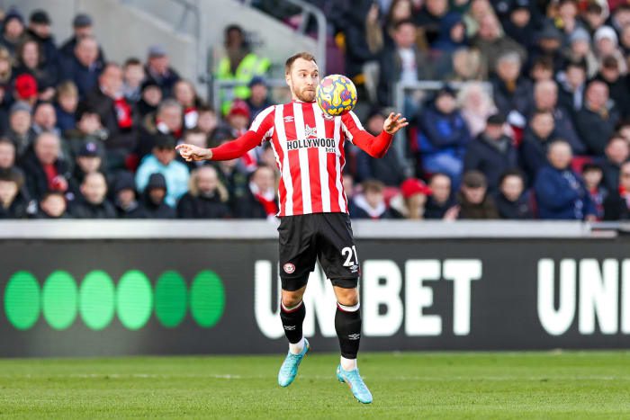 Christian Eriksen controls the ball on his debut in the Premier League with Brentford