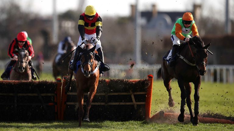 Knight Salute (left) is ridden by jockey Buddy Brennan on their way to winning the Coral Adonis Events Race at Kempton Park Racecourse.  Photo date: Saturday, February 26, 2023.