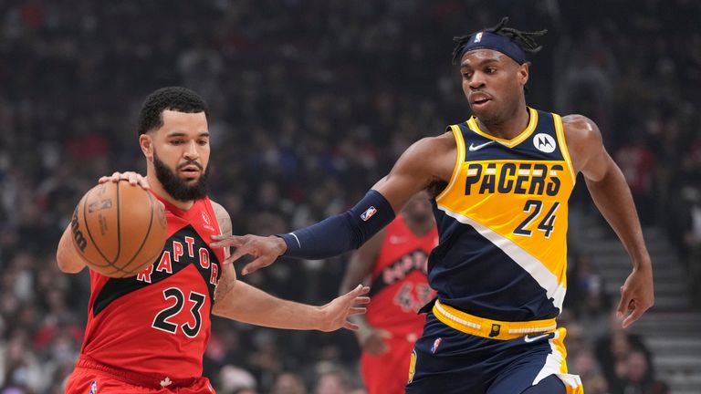 Toronto Raptors guard Fred Van Fleet (23) is defended by Indiana Pacers guard Buddy Heald (24) during the first half of an NBA basketball game on Saturday, March 26, 2023, in Toronto.  (Frank Jean/The Canadian Press via AP)