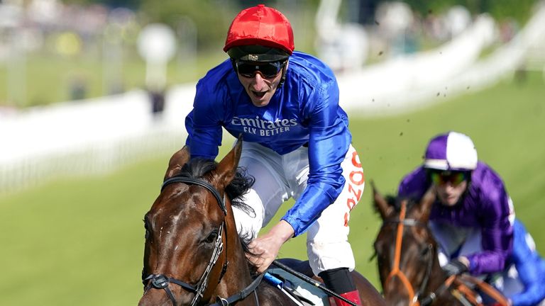 Adam Kirby celebrates Adyar's win in the Kazoo Derby