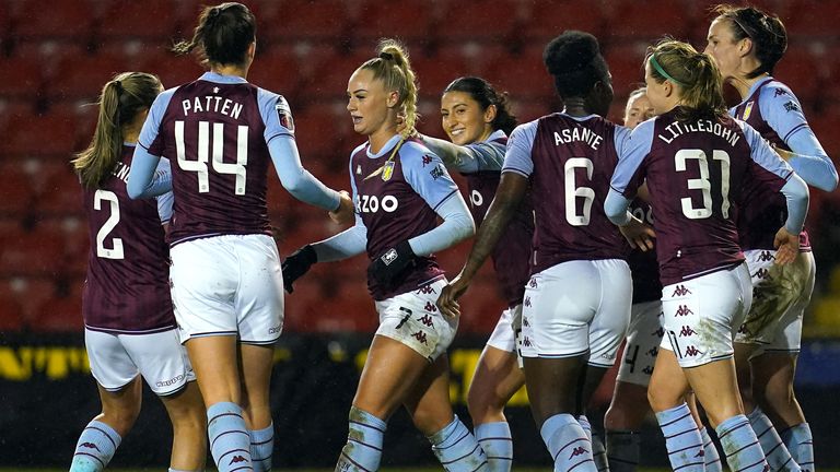 Alisha Lehmann (centre) celebrates scoring the equalizer with a penalty kick