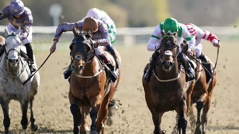 Soaring Angel (right) haunts his home to Samergand at the Sprint Championships in Lingfield on Finals Day last year