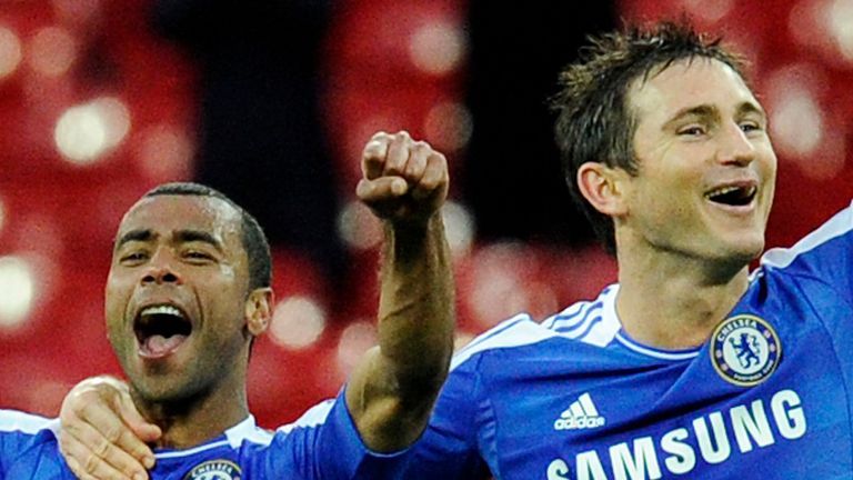 Chelsea's Frank Lampard and teammate Ashley Cole celebrate after defeating Tottenham Hotspur in the FA Cup semi-final match at Wembley Stadium in London, Sunday, April 15, 2012 (AP Photo/Tom Hevezi)