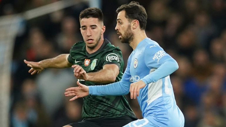 Bernardo Silva, Manchester City, right, takes on the Sporting Goncalo Inacio challenge 