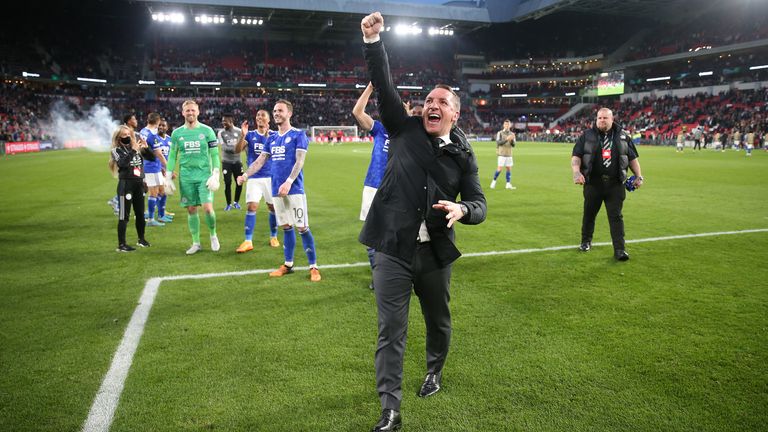 Brendan Rodgers and his players from Leicester City celebrate their win over PSV Eindhoven