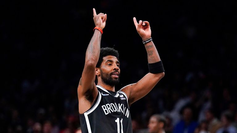 Brooklyn Nets'  Kyrie Irving's reaction after dumping a basket during the second half of the inaugural NBA play-in basketball game against the Cleveland Cavaliers, Tuesday, April 12, 2023, in New York.  (AP Photo / Seth Wenig)