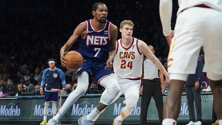 Brooklyn Nets forward Kevin Durant leads a basket during the fourth period of an NBA game against the Cleveland Cavaliers