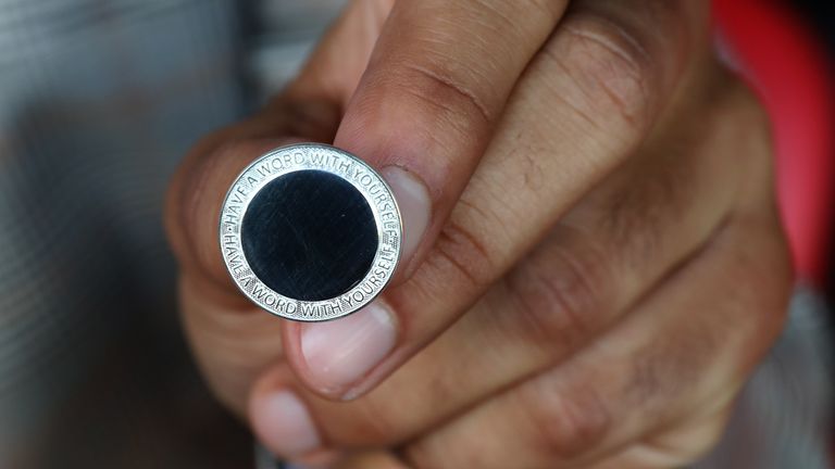 A badge displaying the new campaign message that reads: "talk to yourself"