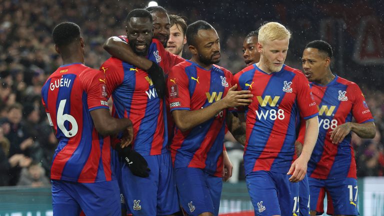 Cheikho Kouyate celebrates at Crystal Palace with his teammates after scoring against Stoke City