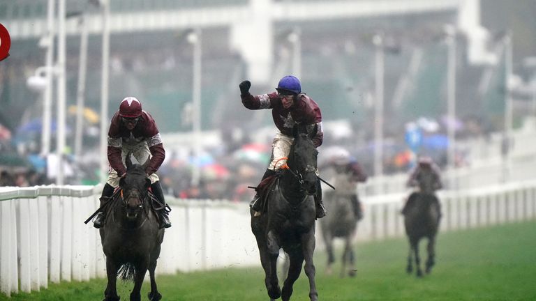 Jack Kennedy punches the air as Delta Work beats Tiger Roll at Cross Country Chase