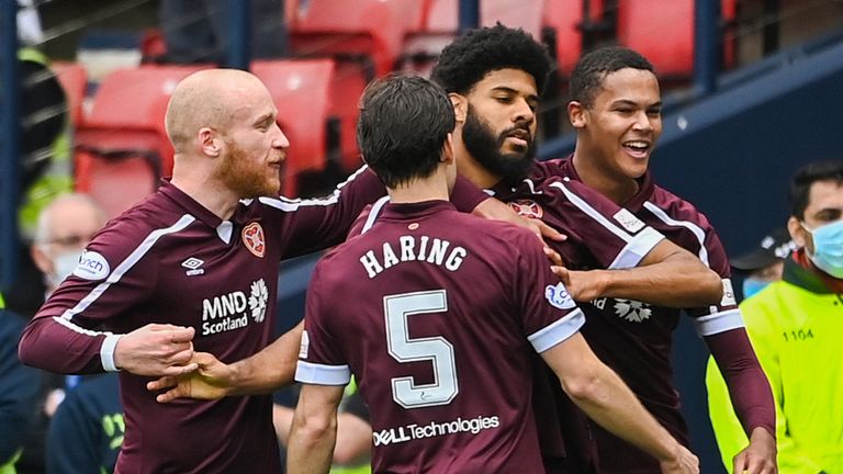 Hearts players celebrate after Ellis Sims (centre) made it 2-0 during the Scottish Cup semi-final