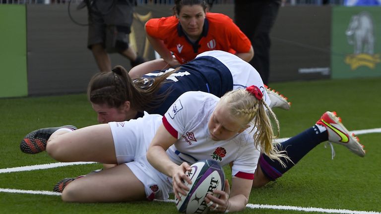 Heather Coyle crosses England's third shot in the corner 
