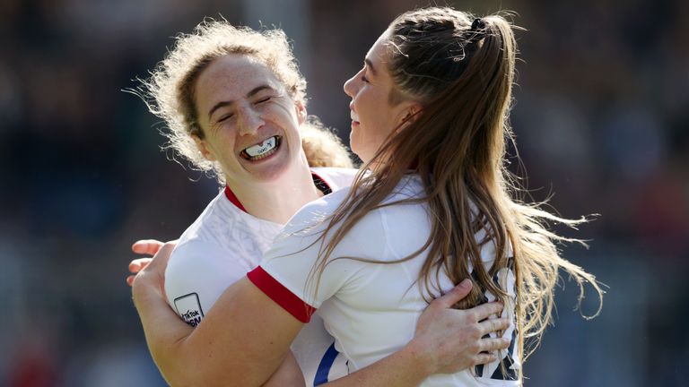 Abby Dow and teammate Holly Aitchison celebrate England's victory over Scotland at the Women's Nations Championship 