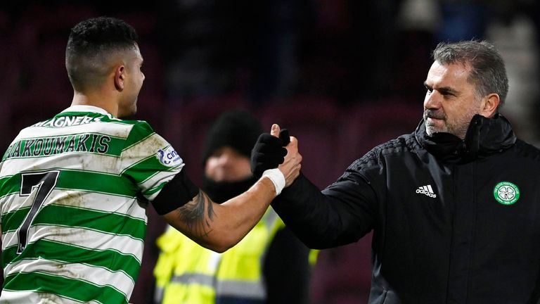 Giorgos Giakomakis and Angie Postecoglou celebrate at Tynecastle