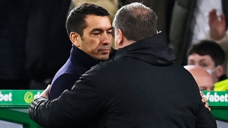Glasgow, Scotland - February 02: Celtic manager Ange Postecoglou and Giovanni van Bronckhorst shake hands during a Premier League match between Celtic and Rangers at Celtic Park, on February 2, 2023, in Glasgow, Scotland.  (Photo by Rob Casey/SNS Group)