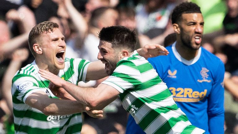 Celtic's Greg Taylor celebrates by making it 1-0