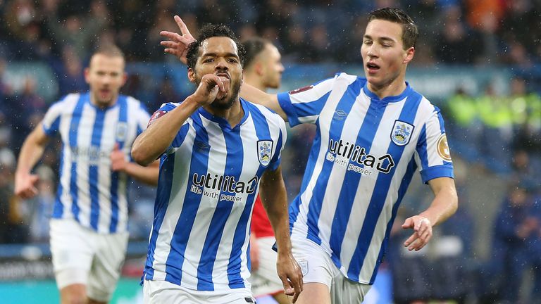 Huddersfield Town Duane Holmes celebrates scoring against Barnsley