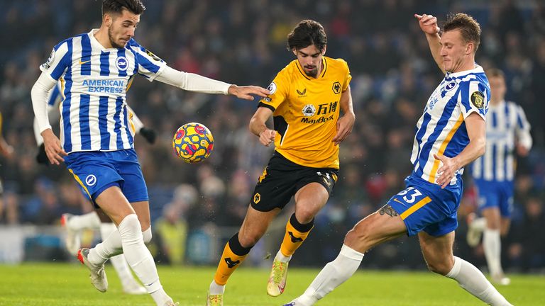 Jacob Moder and Dan Burn-Brighton fight with Wolves.  Francisco Trincao