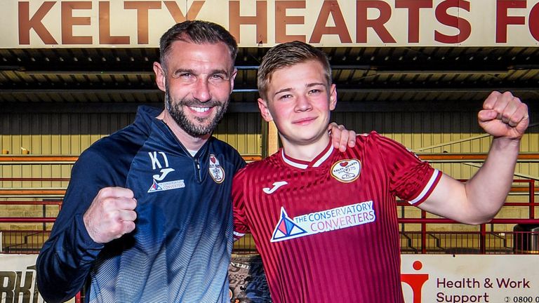 Keelty Hearts president Kevin Thompson and top scorer Maxime Kocheravi celebrate their second league title win