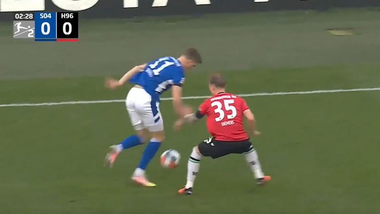 Mark Demers battles for the ball for Hannover against Schalke 04