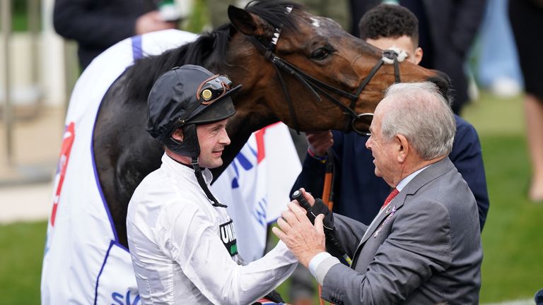 Michael Buckley salutes Nico de Boinville after Constitution Hill's victory in 