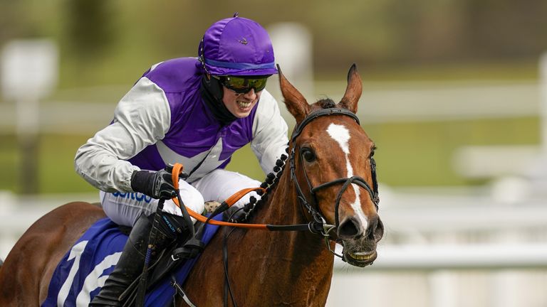Ms Milner on her way to victory in the Birtumps final in Cheltenham