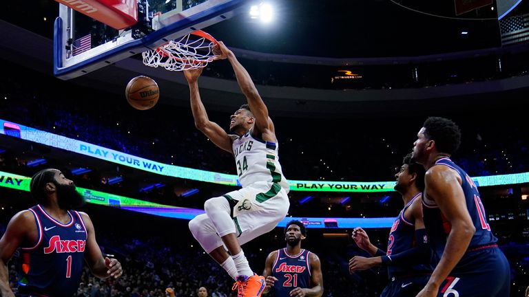 Milwaukee Bucks'  Giannis Antetokonmo dunks the ball during the first half of an NBA basketball game against the Philadelphia 76ers, Tuesday, March 29, 2023, in Philadelphia.