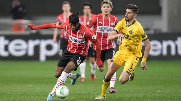 Noni Madwicki, PSV, controls the ball after Maccabi Aidan Nakhmias during the second leg of the second leg match between Maccabi Tel Aviv and PSV Eindhoven at Bloomfield Stadium in Tel Aviv, Israel, Thursday, Feb. 24, 2023. 