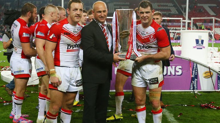 2014 Super League Final: James Robbie lifts the League Cup alongside Nathan Brown and captain Paul Wellens